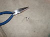 B4247 ST1300 Maintenance metal shaving found in coolant hose.JPG