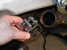 B1048a ST1300 20009-03-07 Service Broken bolt in muffler band.jpg B1048a ST1300 20009-03-07 Service Broken bolt in muffler band.jpg